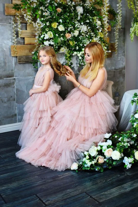 Posing with a nice hair style and dress, Mother Daughter Photoshoot