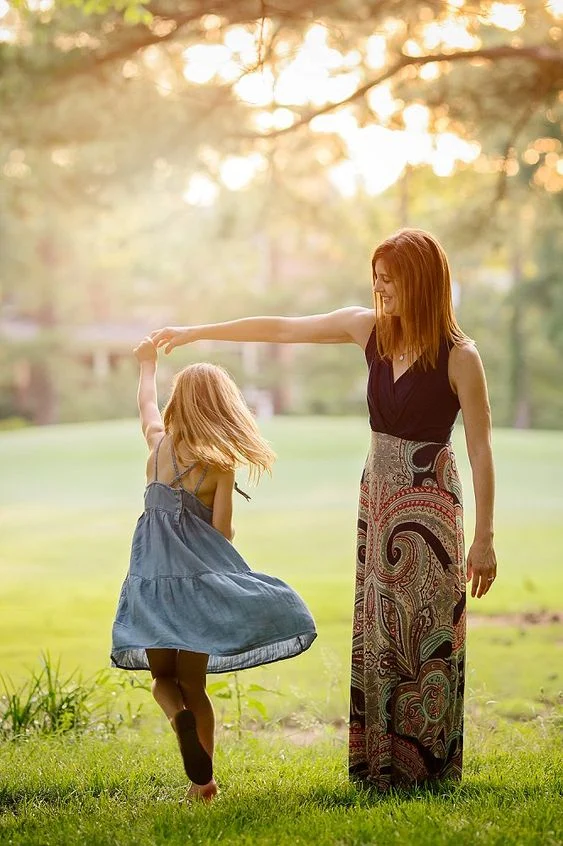 Mother Daughter Dancing Pose